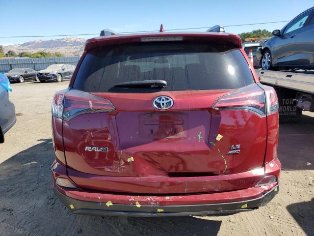 Photo 6 from auction – 2018 TOYOTA RAV4 LE with VIN 2T3BFREV6JW829569