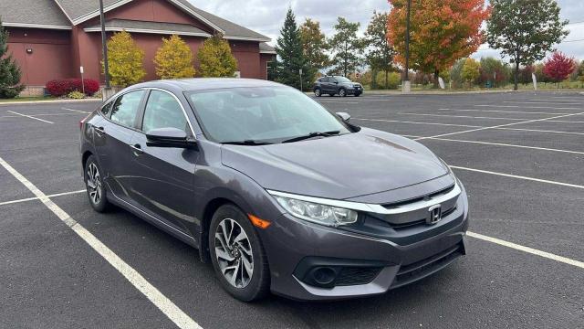 HONDA CIVIC EX 2018 with VIN 2HGFC2F81JH011842 - Photo from auction