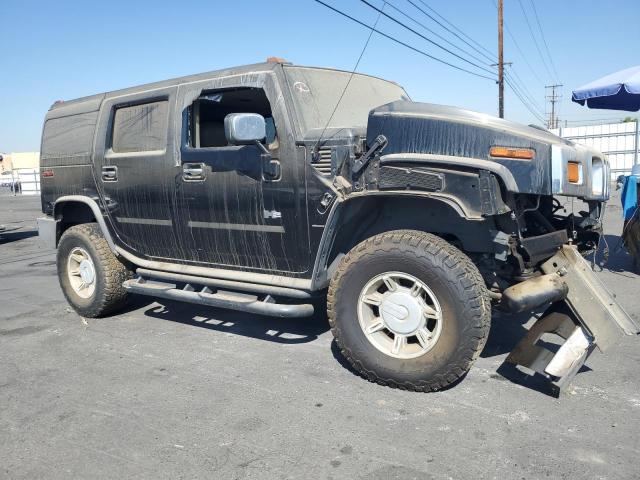 Photo 4 from auction – 2004 HUMMER H2 with VIN 5GRGN23U24H104327