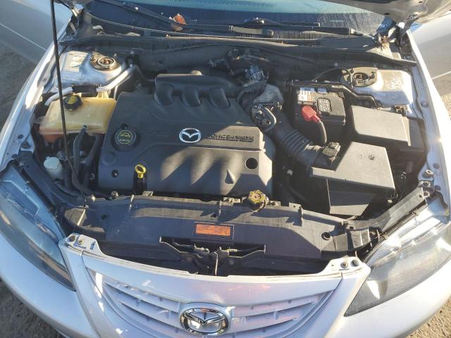 Photo 11 from auction – 2004 MAZDA 6 S with VIN 1YVHP84D845N49491