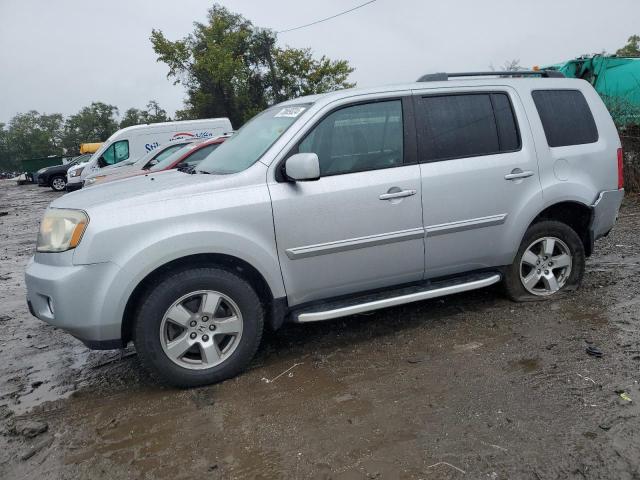 HONDA PILOT EXL 2011 with VIN 5FNYF4H53BB035094 - Photo from auction