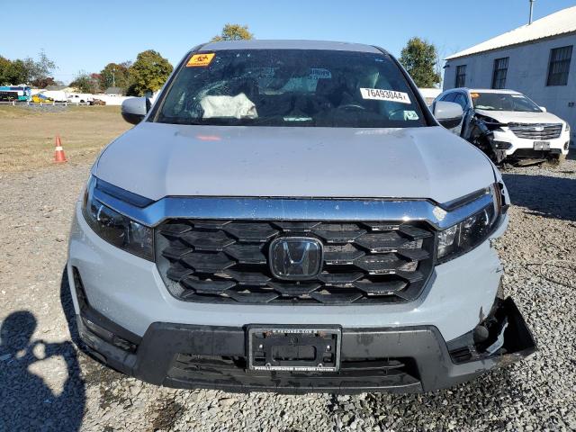 Photo 5 from auction – 2023 HONDA PASSPORT E with VIN 5FNYF8H51PB022486