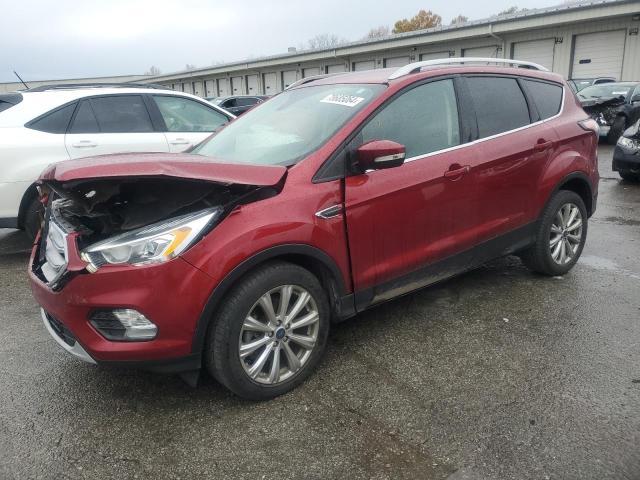 FORD ESCAPE TIT 2017 with VIN 1FMCU0J94HUB00715 - Photo from auction
