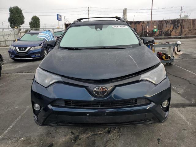 Photo 5 from auction – 2018 TOYOTA RAV4 LE with VIN 2T3BFREV4JW721502