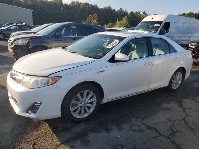 TOYOTA CAMRY HYBR 2014 with VIN 4T1BD1FK3EU136131 - Photo from auction
