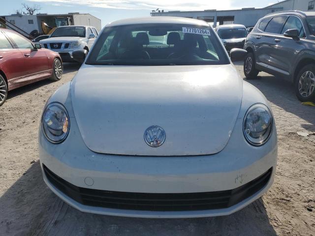 Photo 5 from auction – 2014 VOLKSWAGEN BEETLE with VIN 3VWF17AT7EM640474