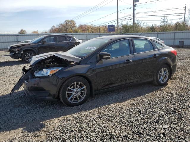 FORD FOCUS SE 2016 with VIN 1FADP3F26GL248615 - Photo from auction
