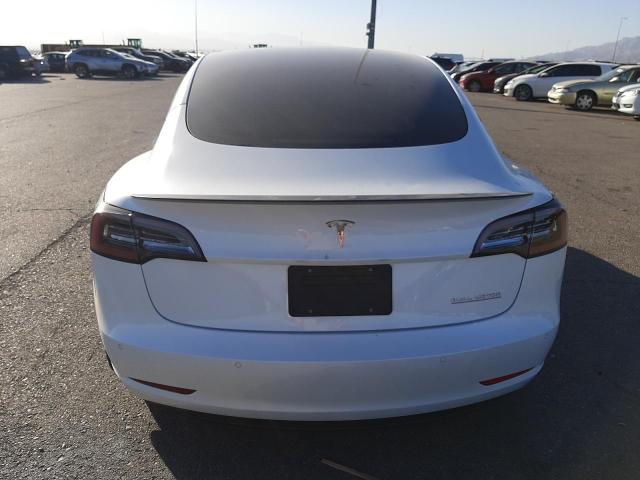 Photo 6 from auction – 2021 TESLA MODEL 3 with VIN 5YJ3E1EC3MF073295