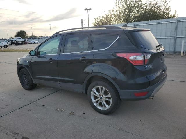 Photo 2 from auction – 2018 FORD ESCAPE SE with VIN 1FMCU9GD8JUD50156