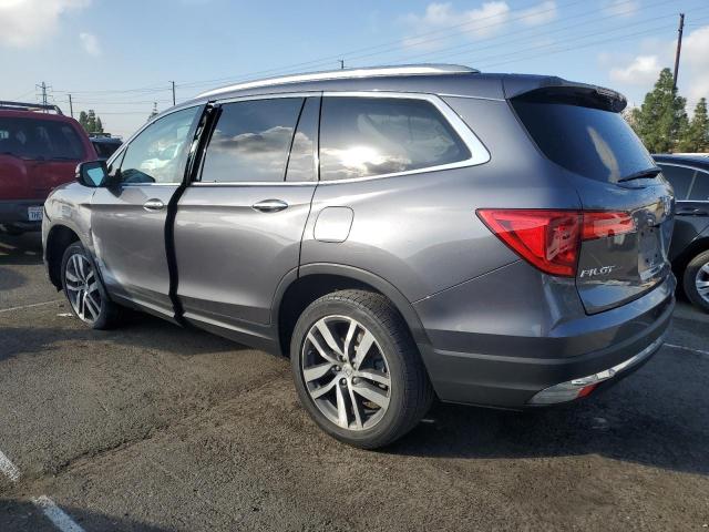 Photo 2 from auction – 2016 HONDA PILOT TOUR with VIN 5FNYF6H93GB009682