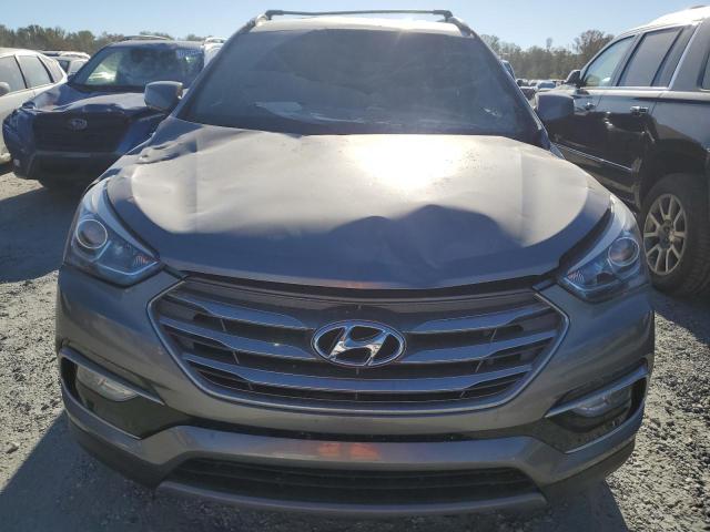 Photo 5 from auction – 2017 HYUNDAI SANTA FE S with VIN 5NMZU3LB0HH002871