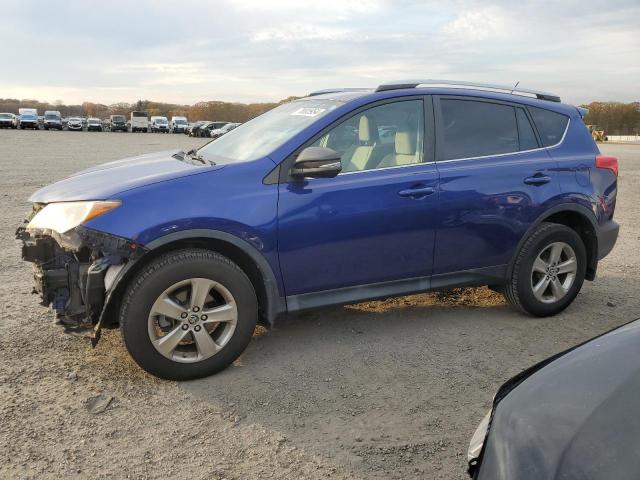TOYOTA RAV4 XLE 2015 with VIN 2T3RFREV1FW261186 - Photo from auction