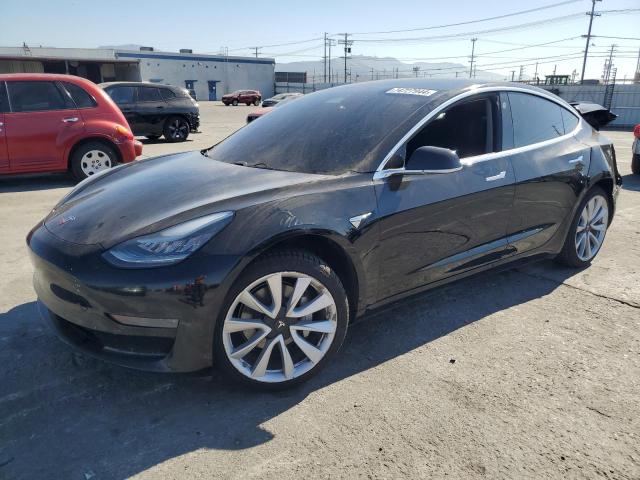TESLA MODEL 3 2019 with VIN 5YJ3E1EA0KF357477 - Photo from auction