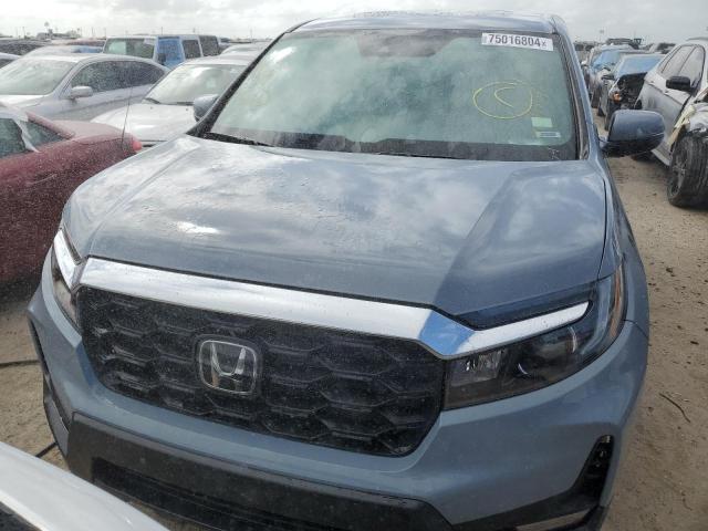 Photo 5 from auction – 2023 HONDA PASSPORT E with VIN 5FNYF8H59PB010912
