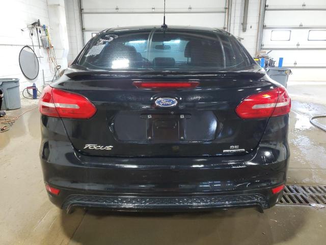 Photo 6 from auction – 2016 FORD FOCUS SE with VIN 1FADP3F26GL357320