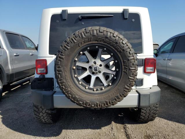Photo 6 from auction – 2012 JEEP WRANGLER S with VIN 1C4AJWBG1CL201942