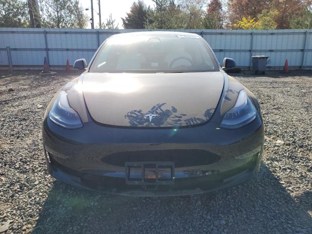 Photo 5 from auction – 2022 TESLA MODEL 3 with VIN 5YJ3E1EB8NF110785