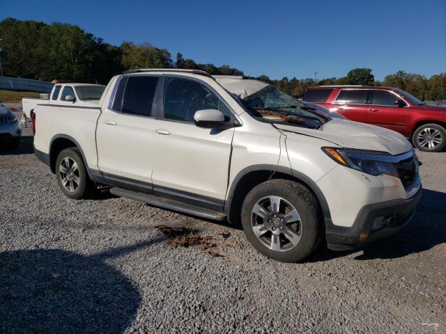 Photo 4 from auction – 2017 HONDA RIDGELINE with VIN 5FPYK3F50HB011912