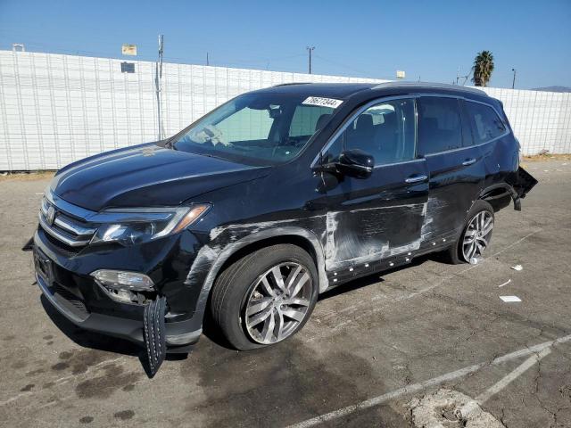 Photo 1 from auction – 2017 HONDA PILOT TOUR with VIN 5FNYF6H93HB075490