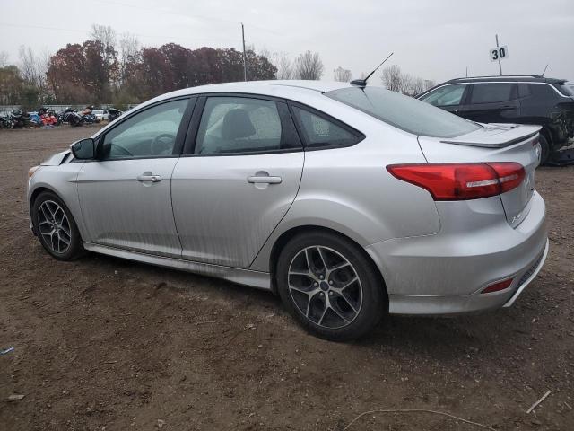 Снимка 2 от търг – 2015 FORD FOCUS SE с VIN 1FADP3F24FL230273