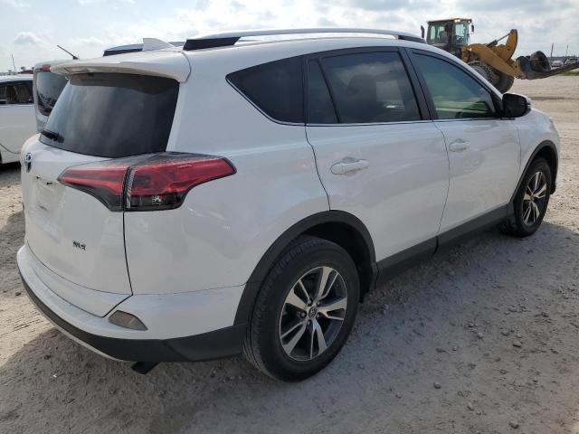 Photo 3 from auction – 2016 TOYOTA RAV4 XLE with VIN JTMWFREV7GJ060539