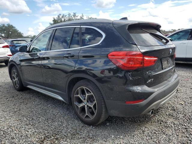 Photo 2 from auction – 2019 BMW X1 XDRIVE2 with VIN WBXHT3C52K5L89834