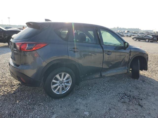 Photo 3 from auction – 2015 MAZDA CX-5 TOURI with VIN JM3KE2CY9F0502190