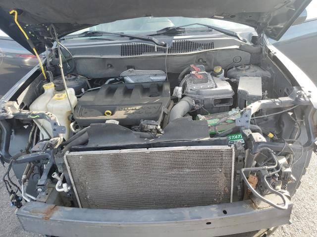 Photo 12 from auction – 2014 JEEP COMPASS LA with VIN 1C4NJDEB6ED694018