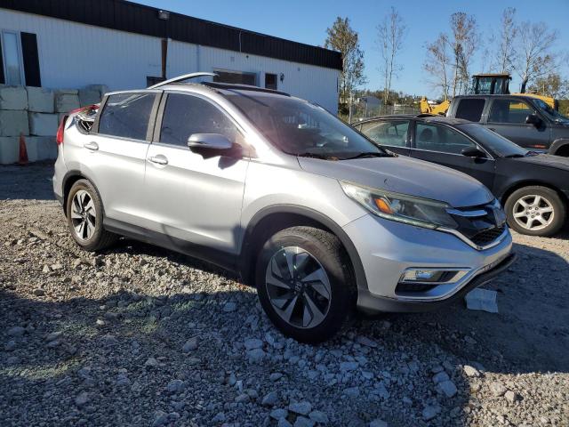 Photo 4 from auction – 2016 HONDA CR-V TOURI with VIN 5J6RM4H93GL001409