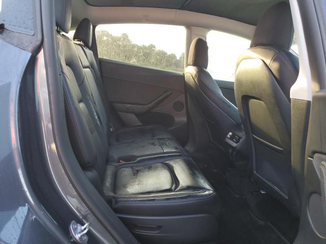 Photo 11 from auction – 2023 TESLA MODEL Y with VIN 7SAYGAEE0PF591891