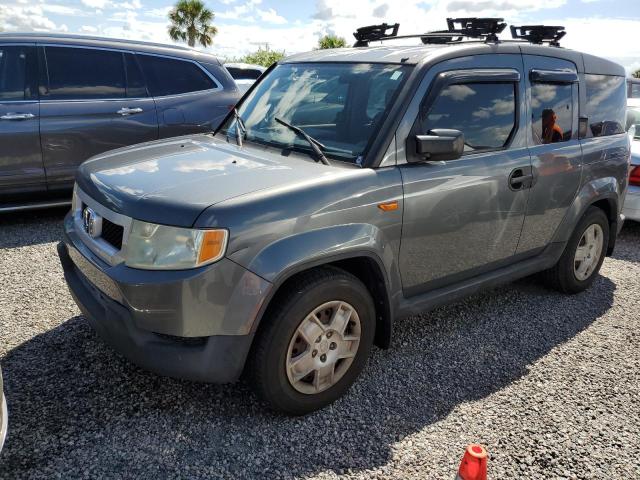 HONDA ELEMENT LX 2011 with VIN 5J6YH1H34BL001292 - Photo from auction
