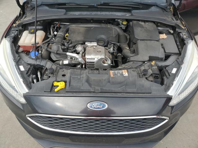 Photo 12 from auction – 2015 FORD FOCUS SE with VIN 1FADP3KE0FL273637