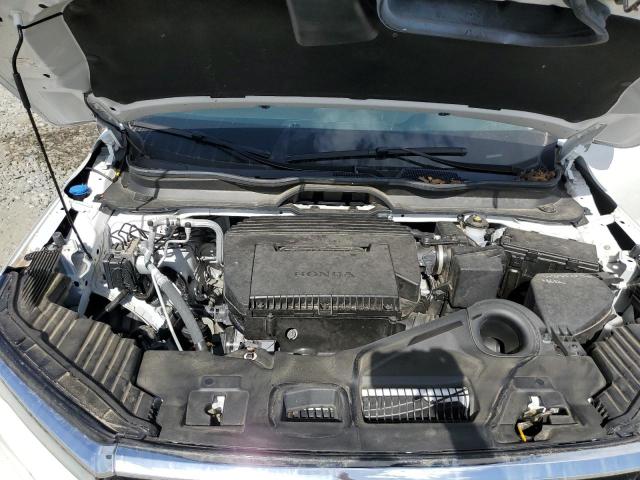 Photo 12 from auction – 2023 HONDA PILOT TOUR with VIN 5FNYG2H76PB013732