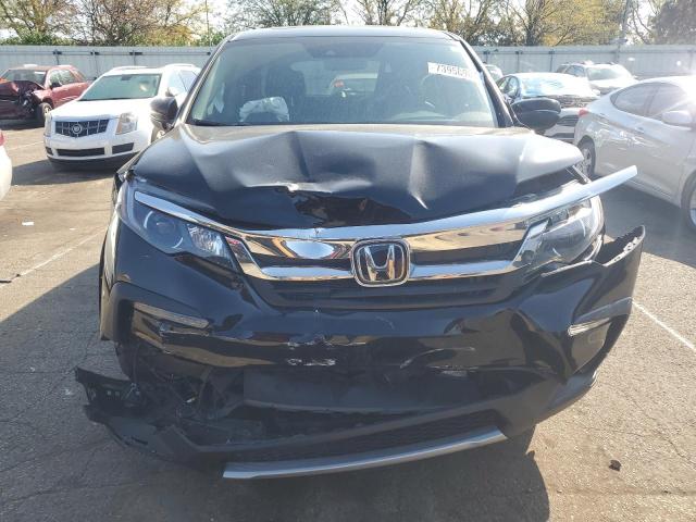 Photo 5 from auction – 2022 HONDA PILOT EXL with VIN 5FNYF6H59NB023399
