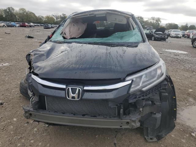 Photo 5 from auction – 2016 HONDA CR-V SE with VIN 5J6RM4H47GL028861