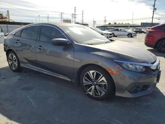 Photo 4 from auction – 2017 HONDA CIVIC EX with VIN 2HGFC1F35HH632526