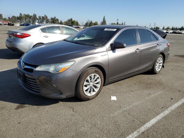 TOYOTA CAMRY HYBR 2015 with VIN 4T1BD1FK3FU147244 - Photo from auction