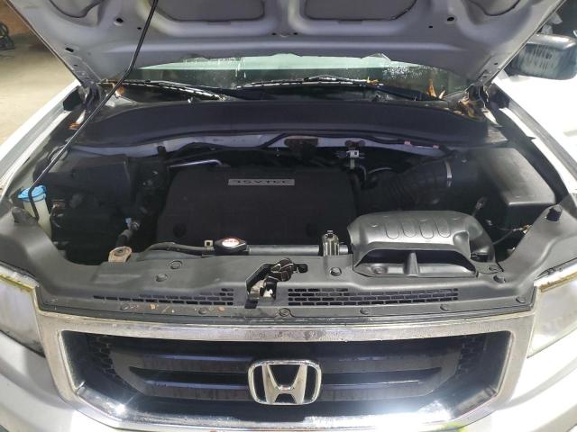 Photo 11 from auction – 2009 HONDA RIDGELINE with VIN 5FPYK16219B103235