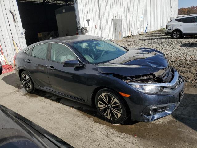 Photo 4 from auction – 2017 HONDA CIVIC EX with VIN 2HGFC1F32HH655052