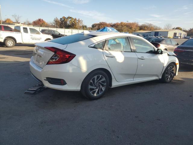 Photo 3 from auction – 2017 HONDA CIVIC EX with VIN 2HGFC2F70HH530804