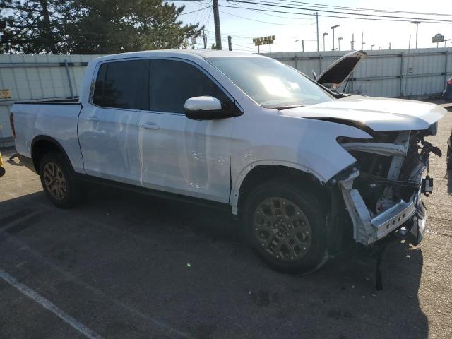 Photo 4 from auction – 2023 HONDA RIDGELINE with VIN 5FPYK3F5XPB063501