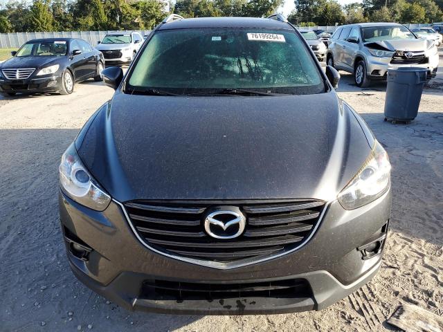 Photo 5 from auction – 2016 MAZDA CX-5 TOURI with VIN JM3KE2CY9G0915986