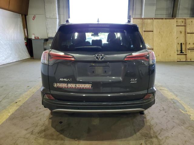 Photo 6 from auction – 2017 TOYOTA RAV4 XLE with VIN JTMRFREV1HJ154673