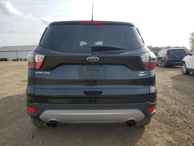 Photo 6 from auction – 2017 FORD ESCAPE SE with VIN 1FMCU9G97HUA28890