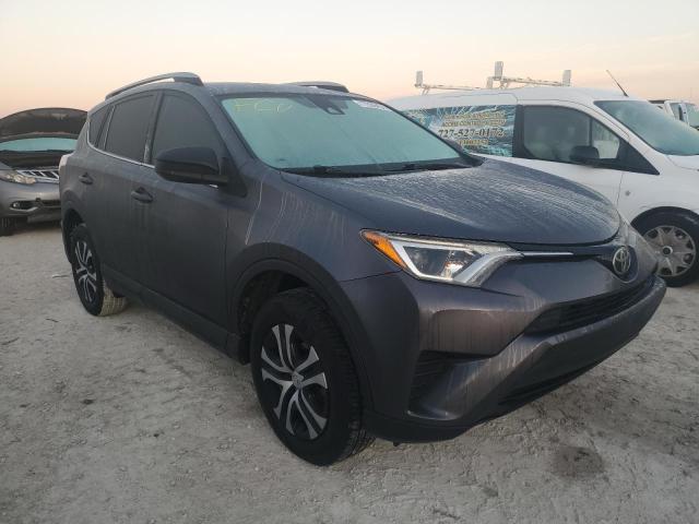 Photo 4 from auction – 2018 TOYOTA RAV4 LE with VIN JTMZFREV2JJ725531