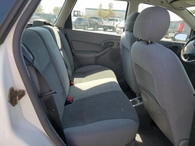 Фото 10 с аукциона – 2004 FORD FOCUS SE с VIN 1FAFP36314W203884