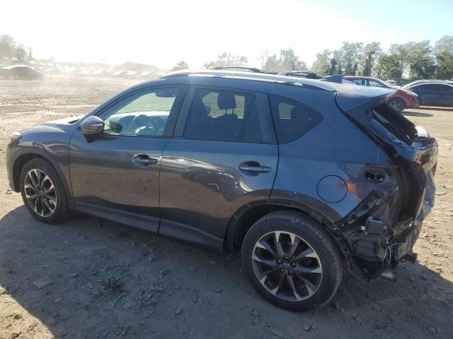 Photo 2 from auction – 2016 MAZDA CX-5 GT with VIN JM3KE4DY3G0763875