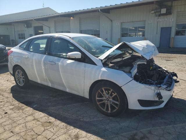 Photo 4 from auction – 2016 FORD FOCUS SE with VIN 1FADP3F27GL214392