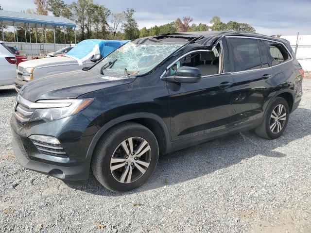 HONDA PILOT EXL 2017 with VIN 5FNYF6H50HB103534 - Photo from auction