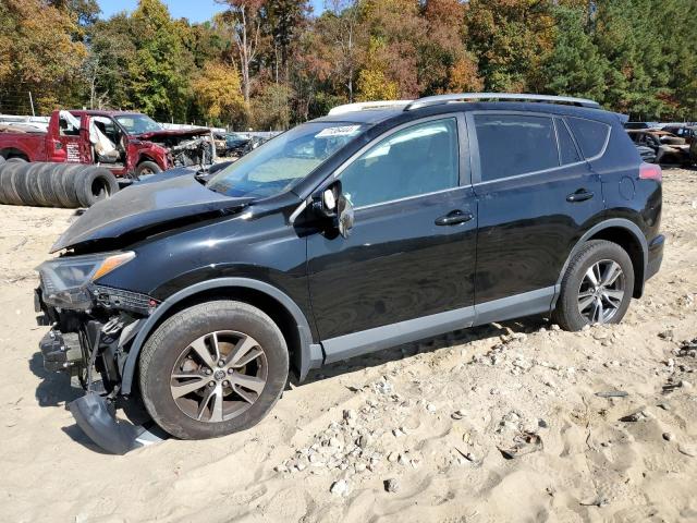 TOYOTA RAV4 XLE 2017 with VIN 2T3RFREV6HW610832 - Photo from auction